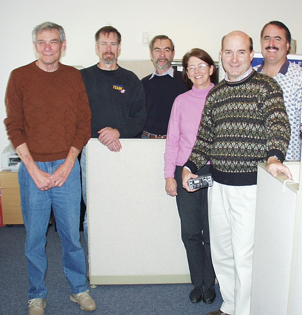 Brian G3MBN (centre) at the Elecraft factory, Aptos, CA.